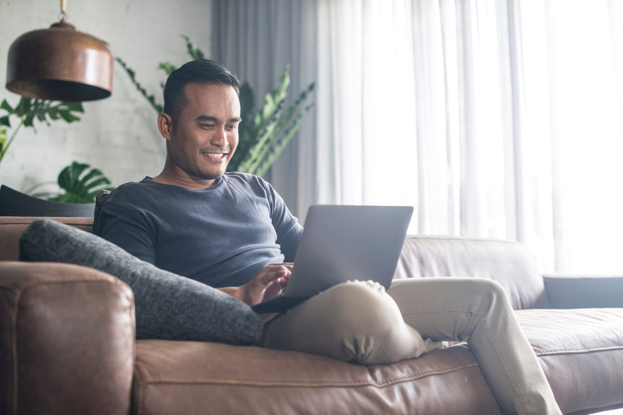 Person reading blog articles on computer